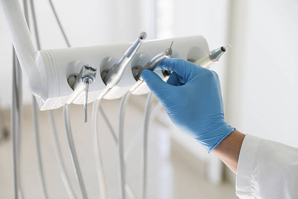 Professional Tooth Extraction technician working in Rosenberg, TX